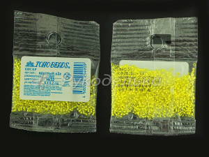Бисер японский TOHO. 15/0. Желтый (32). Прозрачный с посеребренным отверстием. 5гр.